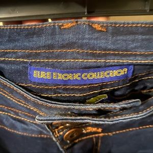 Stretchy Dark denim Distress straight legged jeans